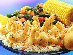 Hmmm... do they really serve these many shrimp? Yes... Perhaps the plate is tiny! : ) Pic: Shrimp Scampi, seasoned rice, vegetable medley, French breadstick, corn on the cob and Fresh Lemon wedge